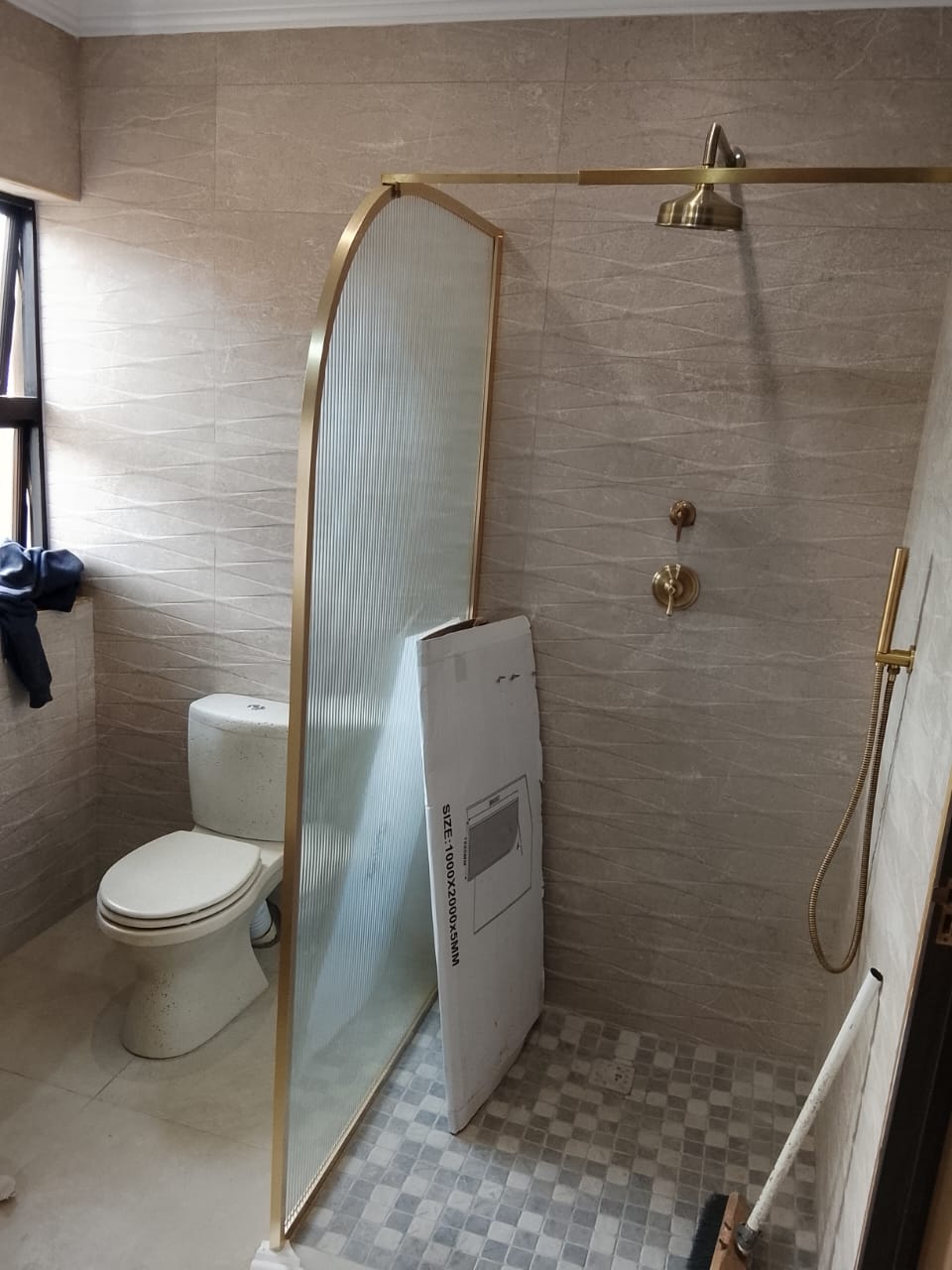 Glass shower screen installed in a renovated Gauteng bathroom