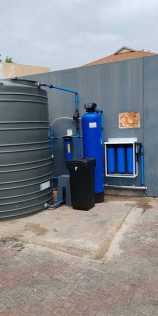 JoJo water tank installed on a stand at a home in Randburg