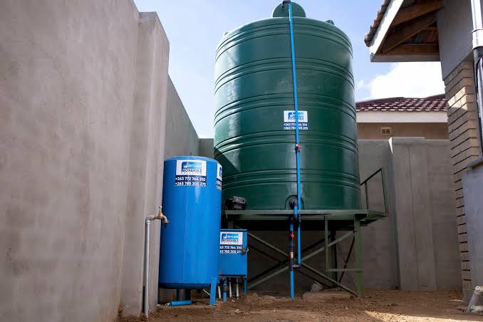 Pump installed for a water storage tank system
