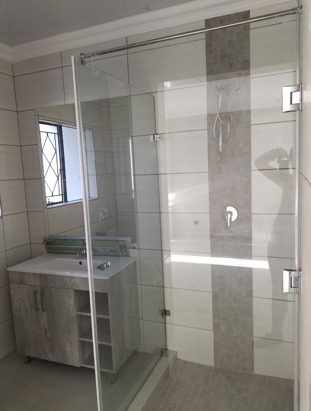 Completed glass shower enclosure in a Gauteng bathroom renovation