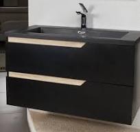 Black vanity and basin installed in a renovated bathroom